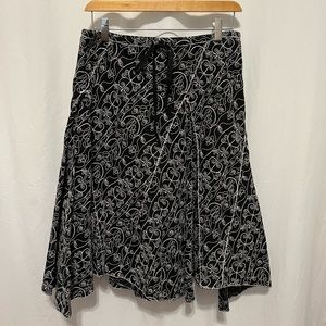 Uneven edge skirt by Max Studio.